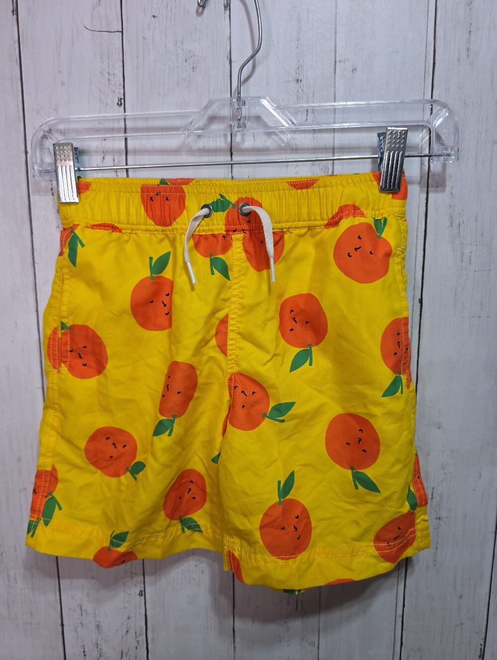 Hanna Andersson Boys Yellow Oranges Print Sunblock Swim Trunks Shorts Size 6-7.